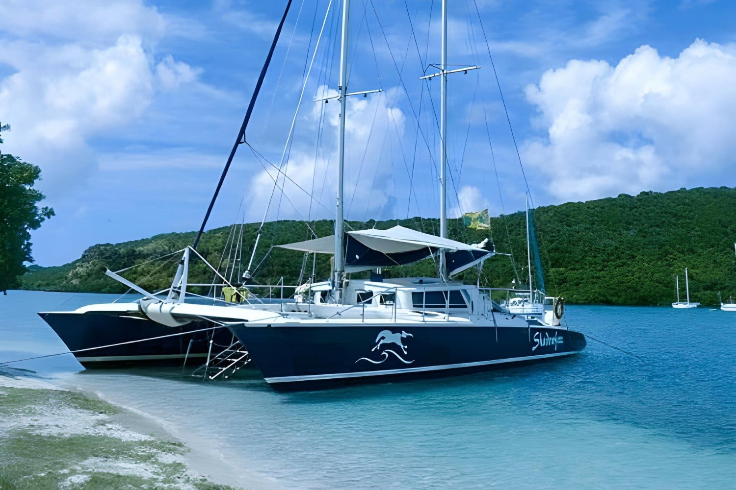 Shadowfax anchored off a Grenada beach